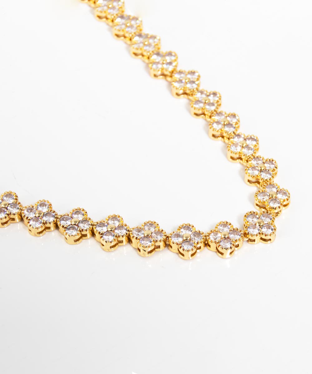 Set of Necklace and Bracelet with Golden Clovers in Zirconia