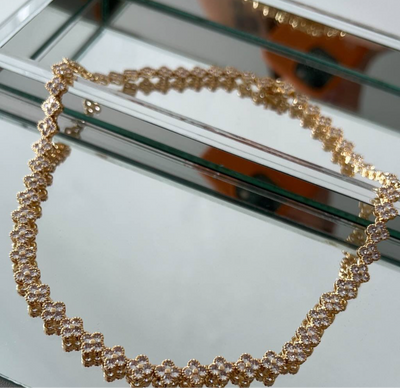 Set of Necklace and Bracelet with Golden Clovers in Zirconia